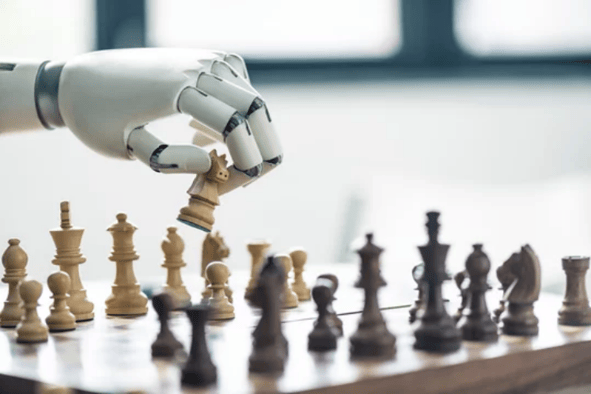 An image of a robot playing chess in an article about developing your AI strategy in schools